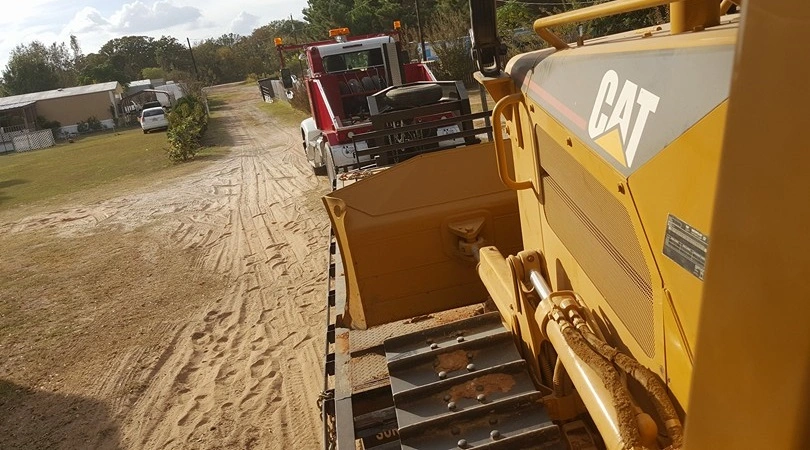 Heavy equipment for mobile home installation
